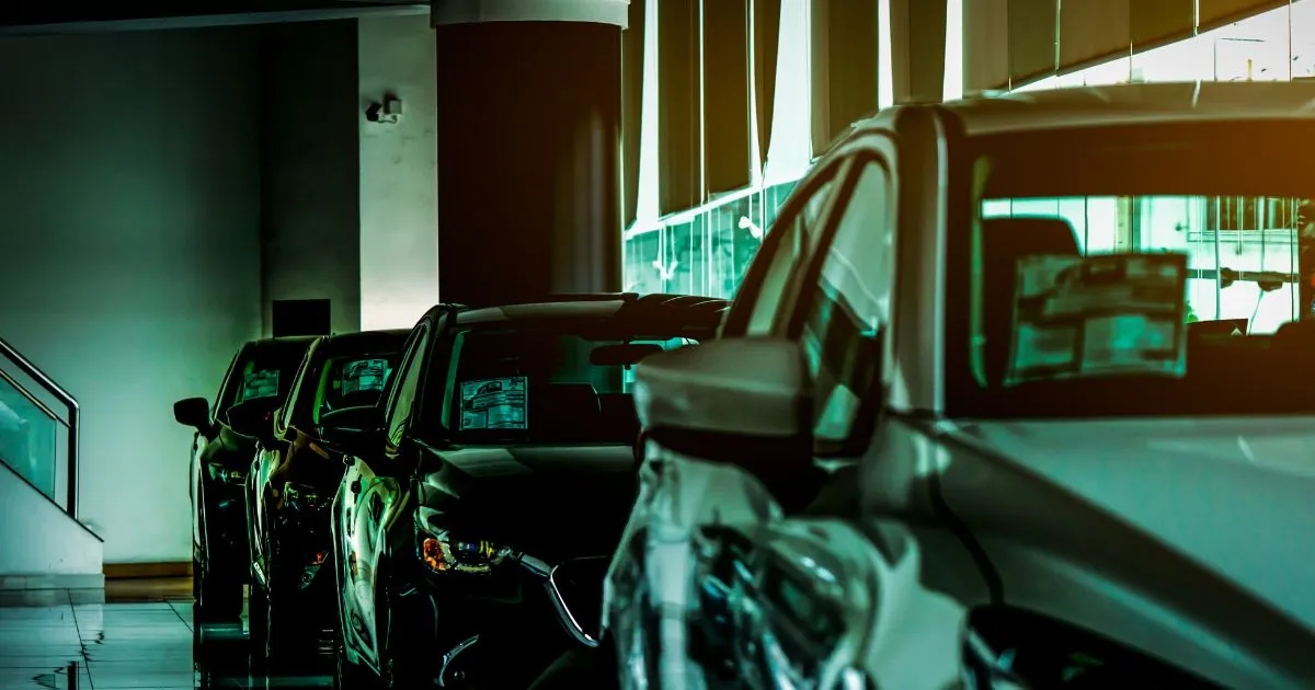 A Car Between Two Parked Cars Preparing To Parallel Park A Car Between Two Parked Cars Preparing To Parallel Park