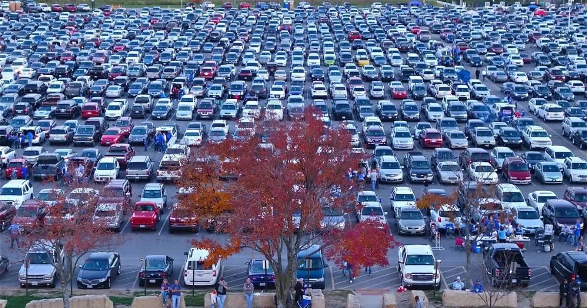 A Busy Parking Lot With Little To No Spaces Left For More Vehicles