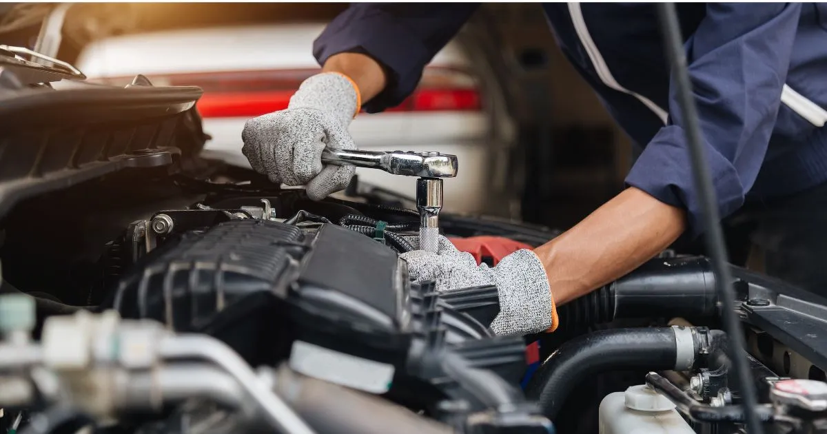 A Car Mechanic At Work