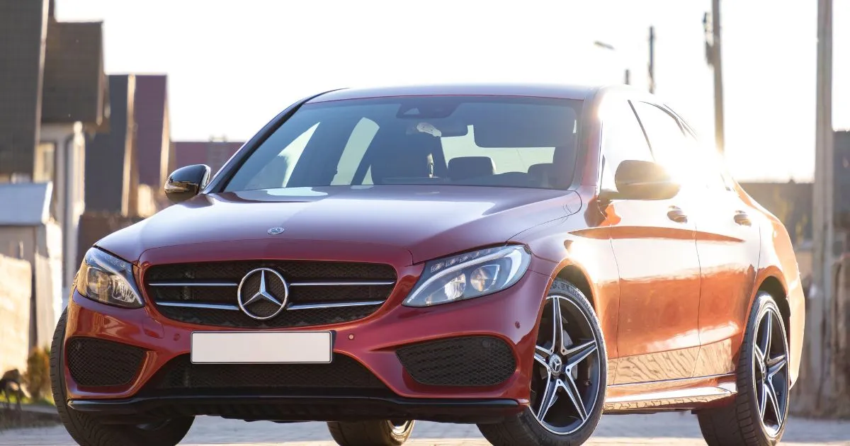 A Classic Mercedes Benz In Red On The Road A Classic Mercedes Benz In Red On The Road