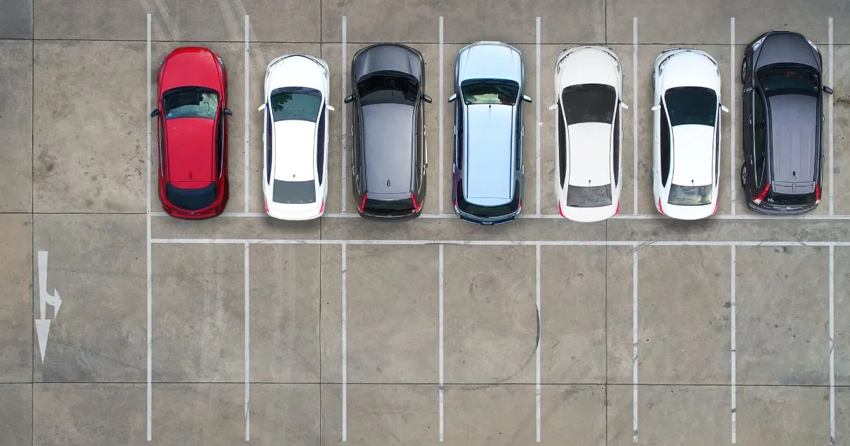 A Clean Parking Lot With Clear Markings And Signs A Clean Parking Lot With Clear Markings And Signs