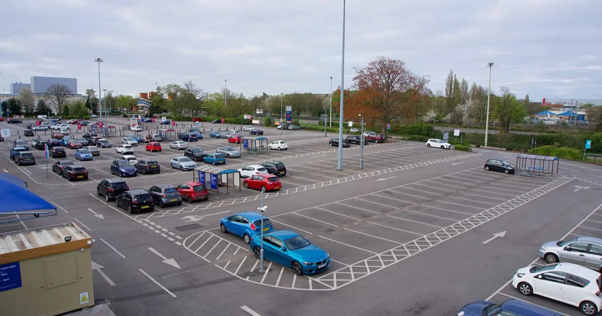 A Convention Centre Parking Lot With Uncovered Parking Spaces