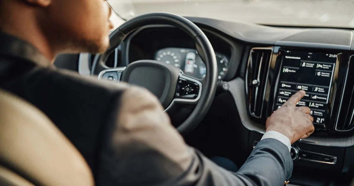A Driver About To Park His Car In The Parking Space