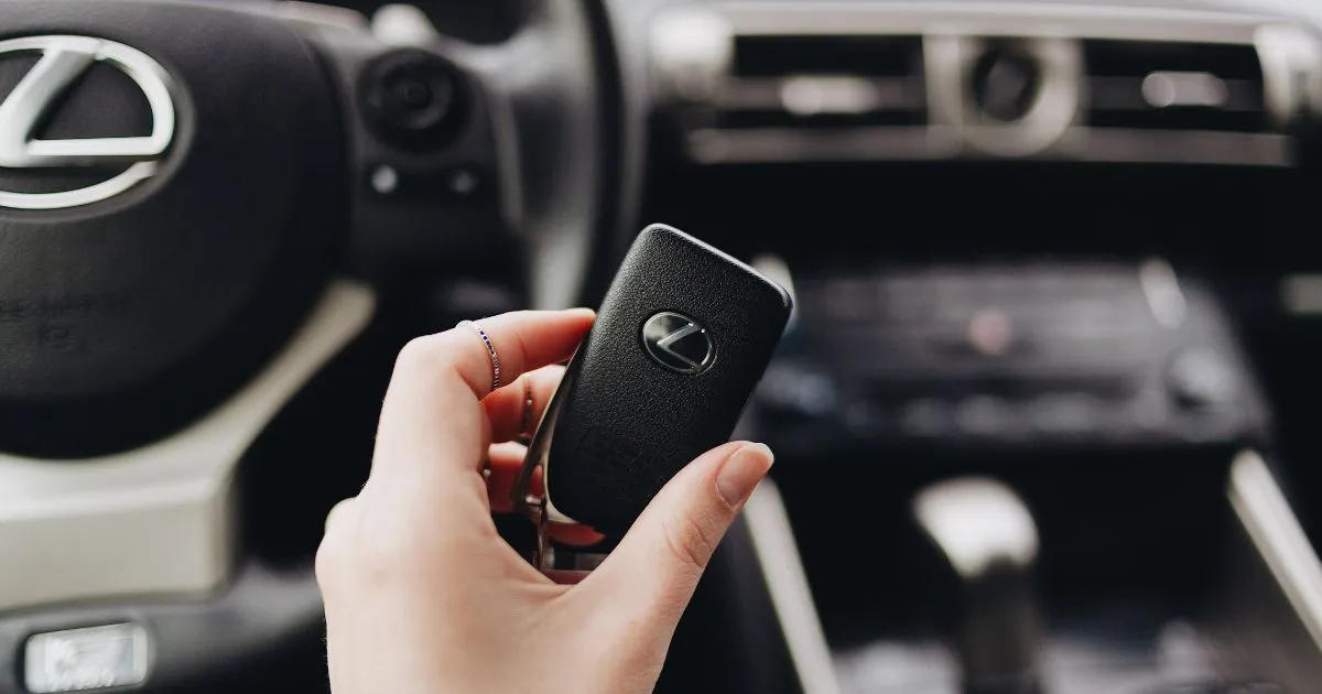 A Driver With A Smart Car Key In Her Hand A Driver With A Smart Car Key In Her Hand