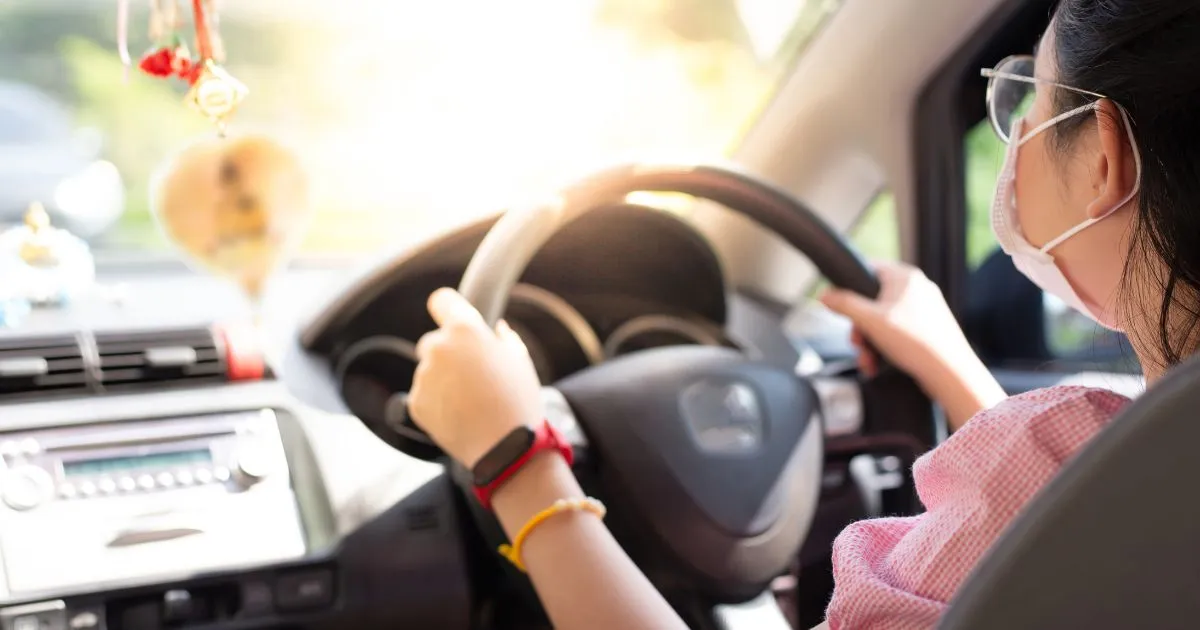 A Female Driver Hunting A Parking Space For Her Car In A City A Female Driver Hunting A Parking Space For Her Car In A City