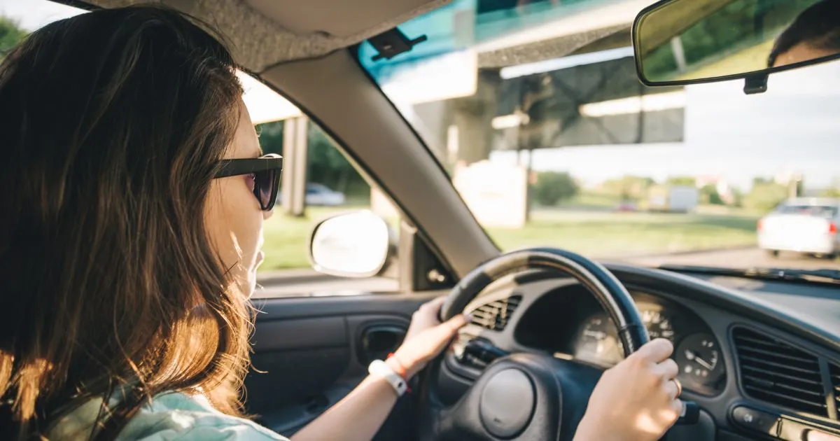 A Female Driver Searching For Parking Space In Sydney
