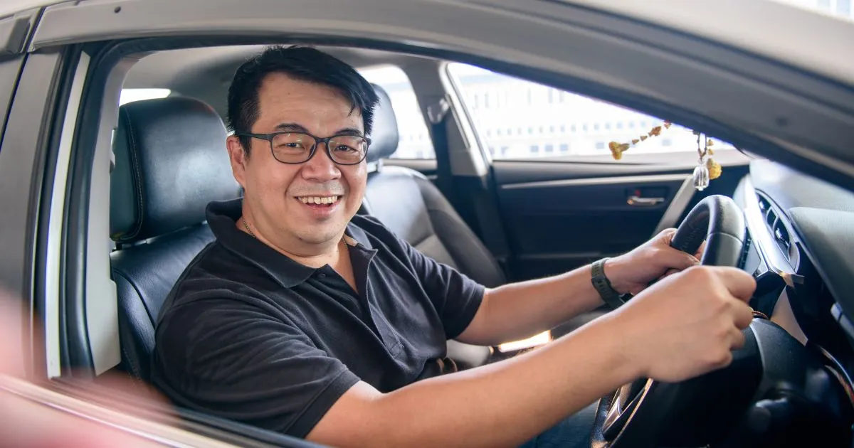 A Happy Driver After Conveniently Parking His Vehicle In A Reserved Space