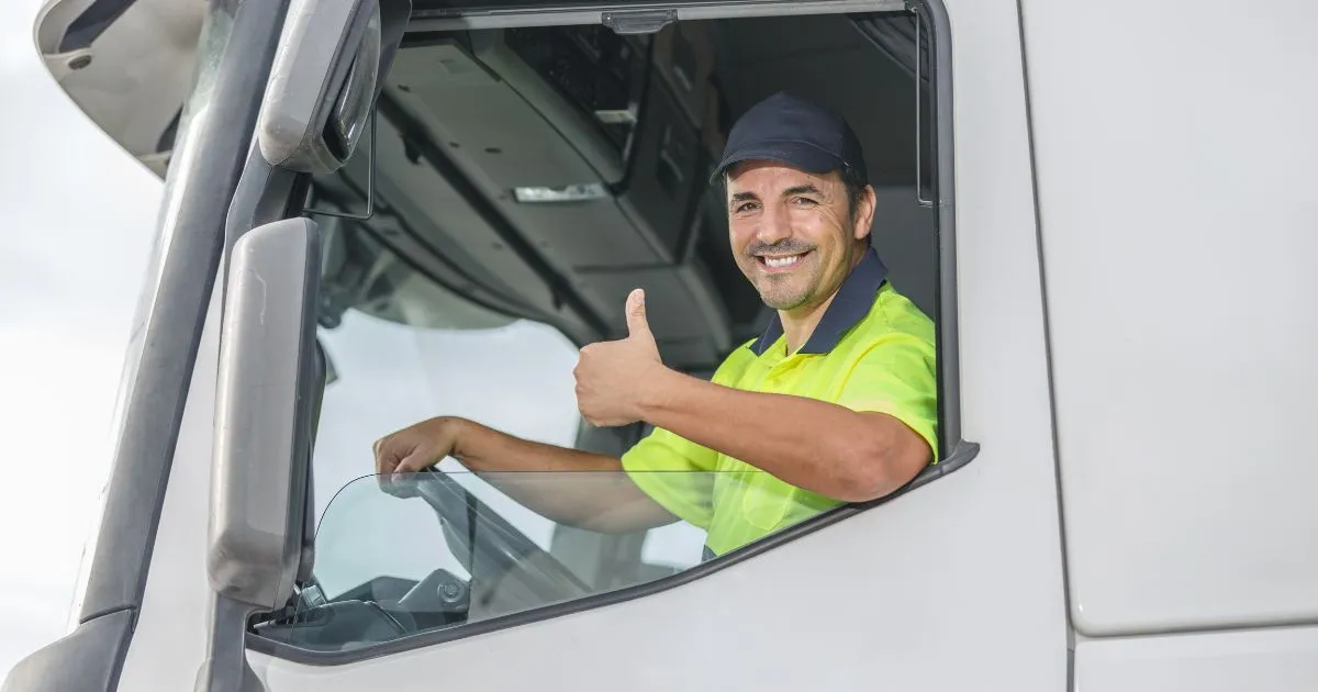A Happy Driver Showing Thumbs Up After Parking His Vehicle