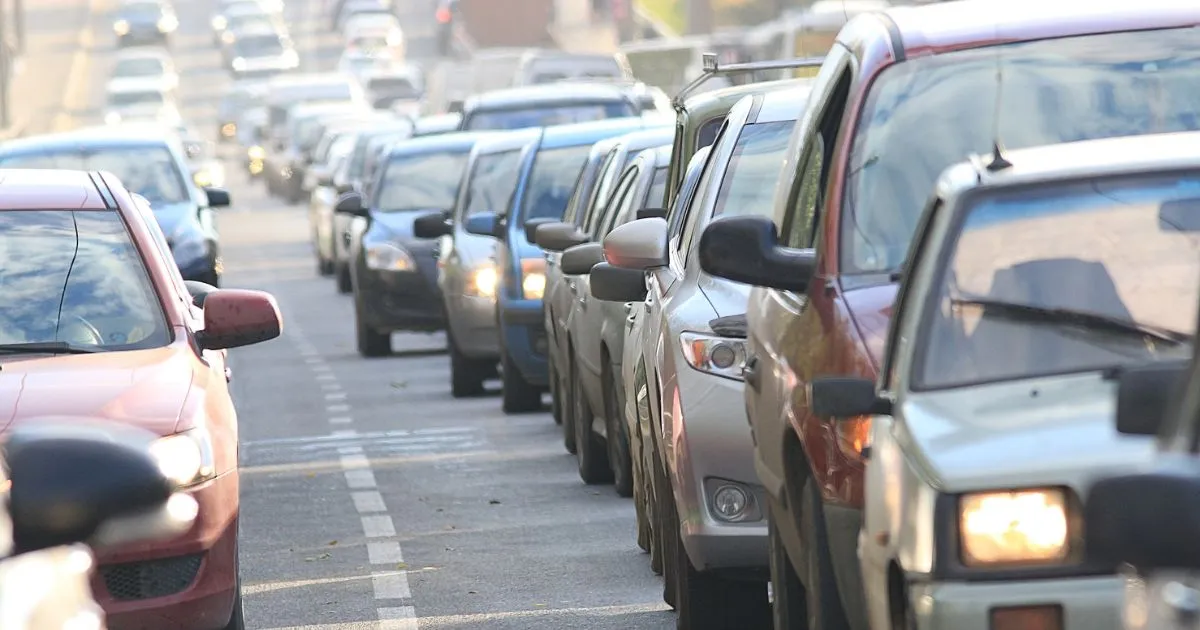 A Highly Congested Road With Tremendous Amount Of Vehicles Moving Ahead A Highly Congested Road With Tremendous Amount Of Vehicles Moving Ahead
