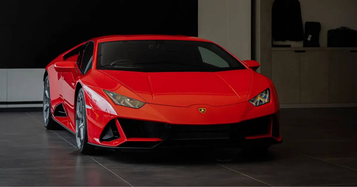 A Legally Parked Red Sports Car In An Indoor Parking Garage