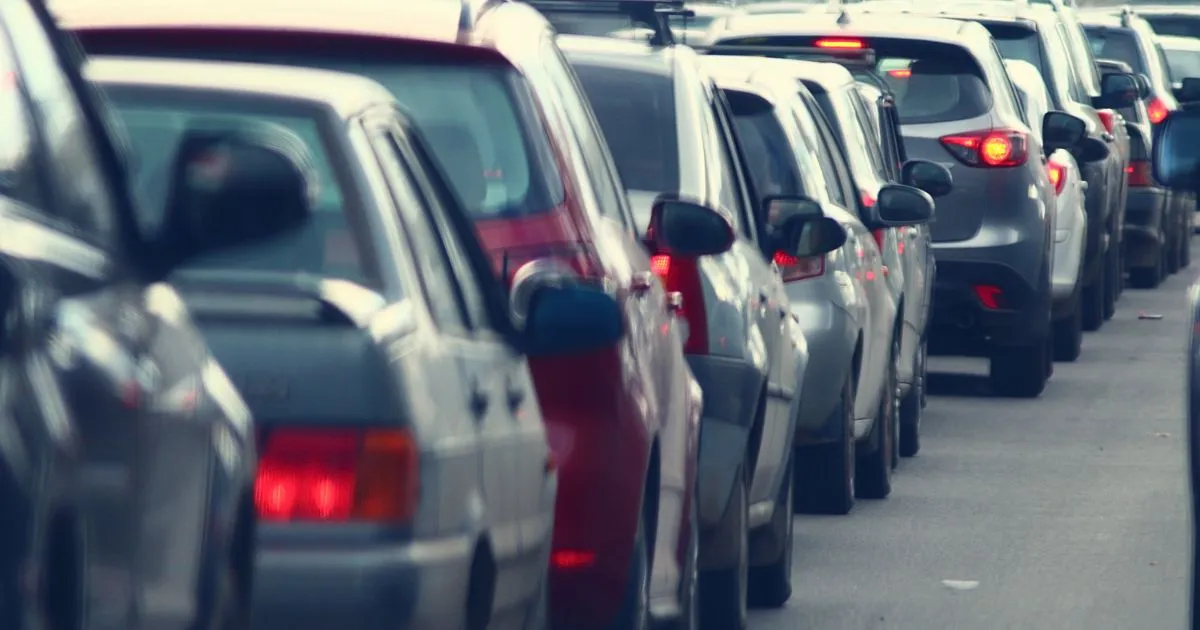 A Long Queue Of Cars Outside A Parking Station In Australia
