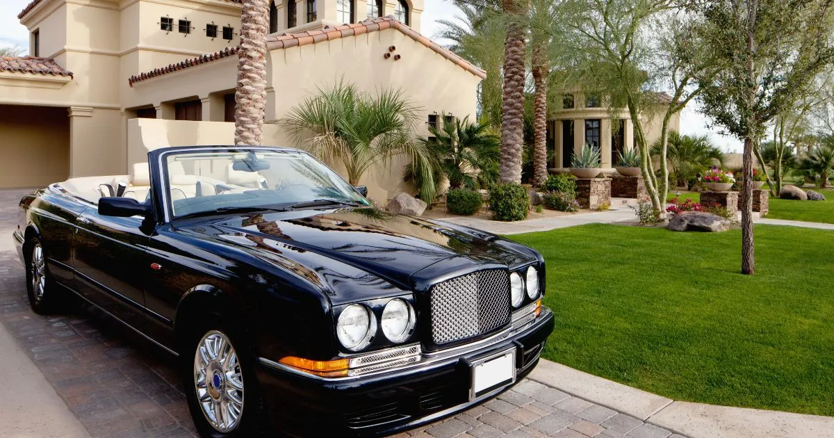 A Luxury Black Car Parked In A Shared Parking Space A Luxury Black Car Parked In A Shared Parking Space