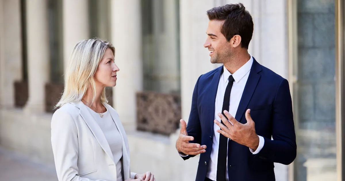A Male And A Female Communicating With Each Other