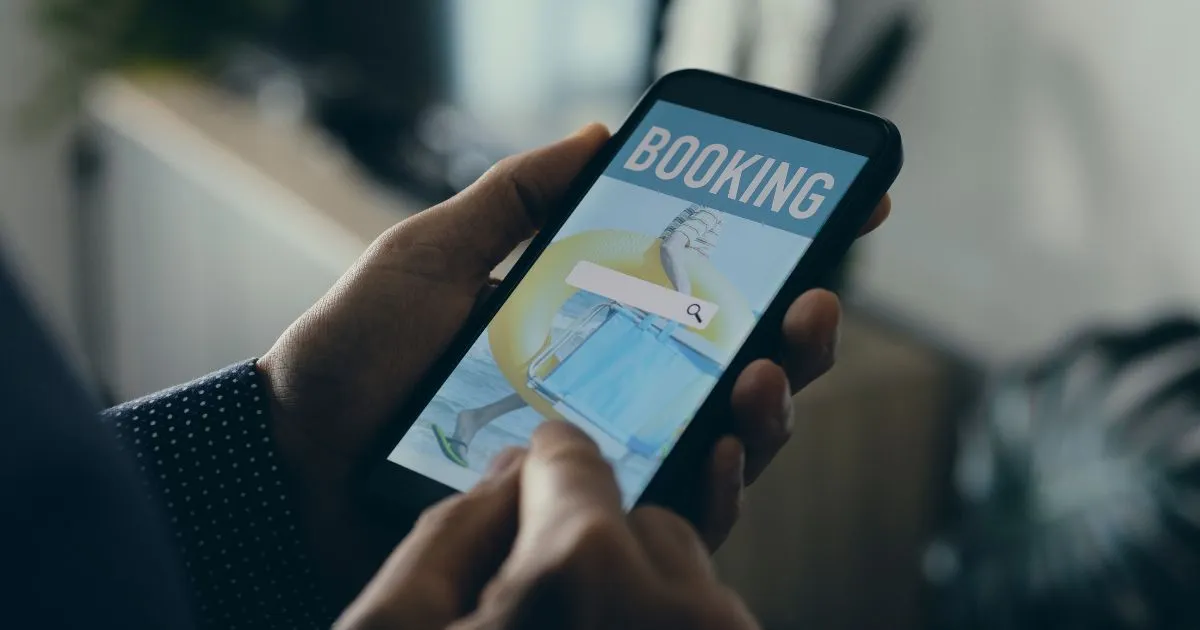 A Man Using His Phone To Find And Book Parking Spaces