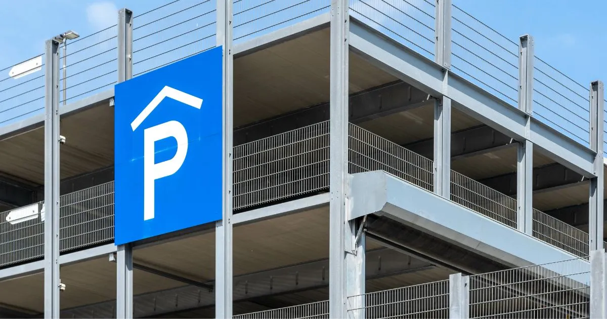 A Multi Level Car Park With A Parking Sign For Guiding Drivers A Multi Level Car Park With A Parking Sign For Guiding Drivers