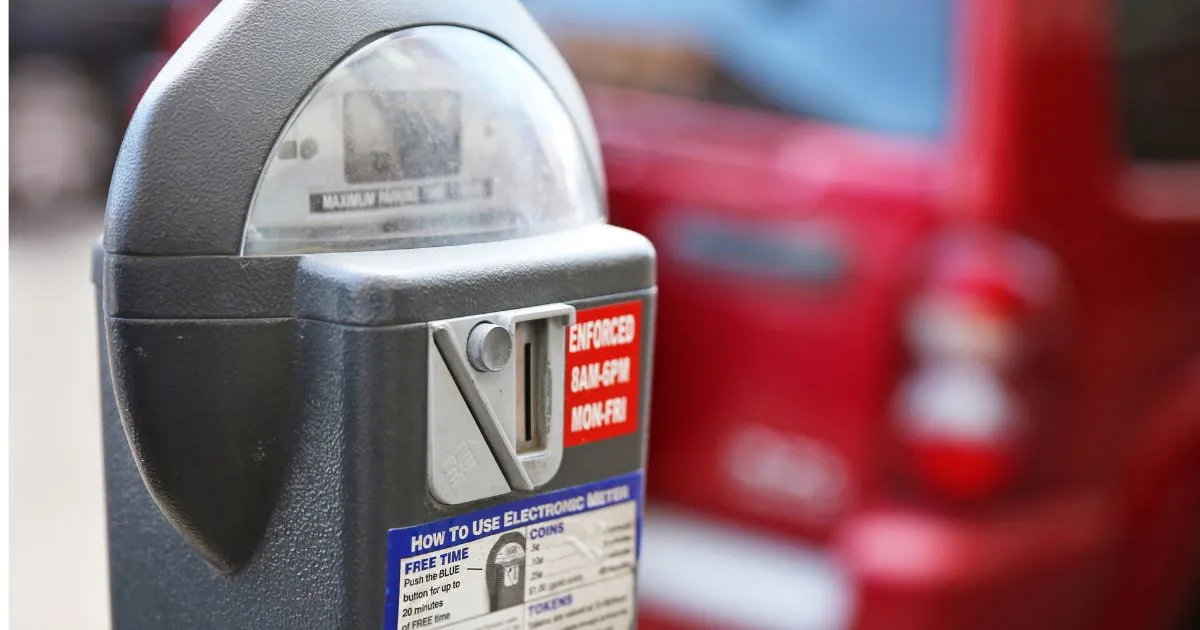 A Parking Meter Installed In A Parking Lot