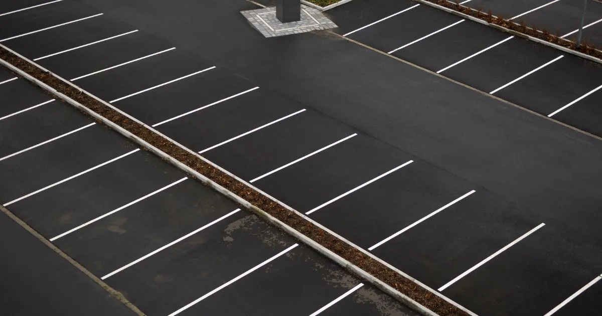 A Public Parking Lot At A Busy City Centre