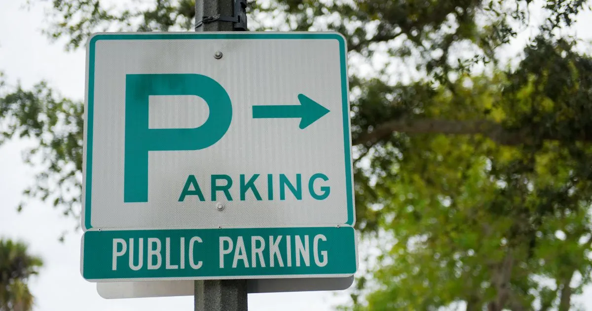 A Public Parking Sign On The Roadside A Public Parking Sign On The Roadside