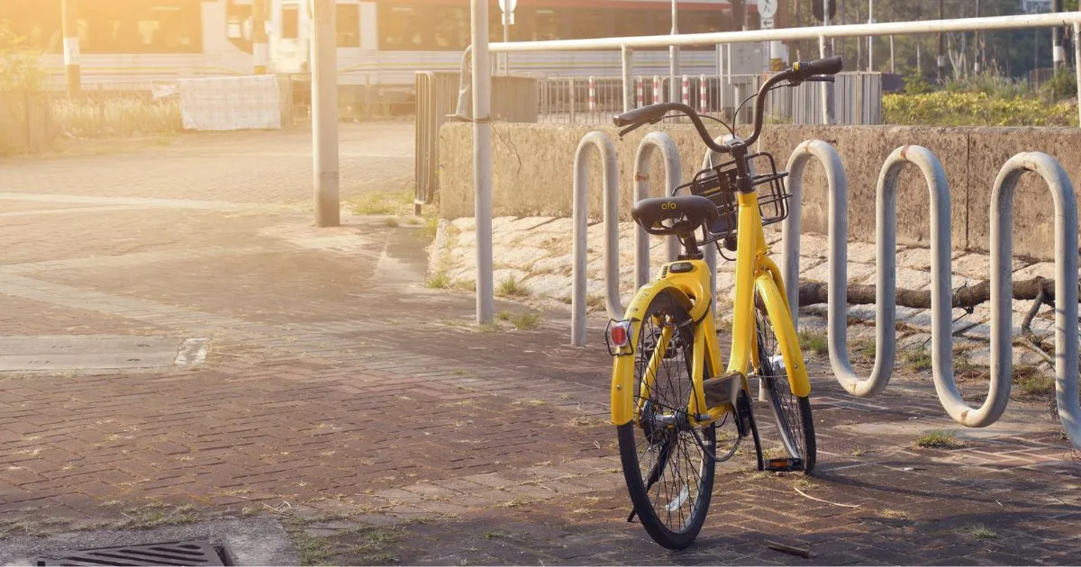 A Shared Bicycle Parking Lot With A Parked Bicycle