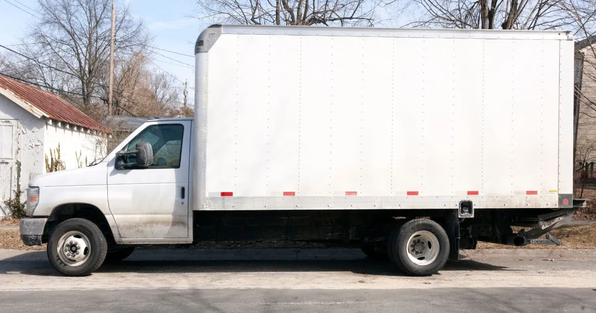 A Truck Parked Outside A Home On A Moving Day A Truck Parked Outside A Home On A Moving Day