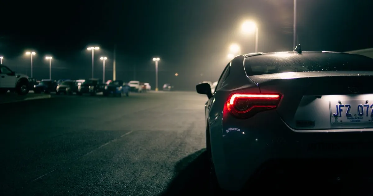 A Turned On Parking Light Of A Car A Turned On Parking Light Of A Car