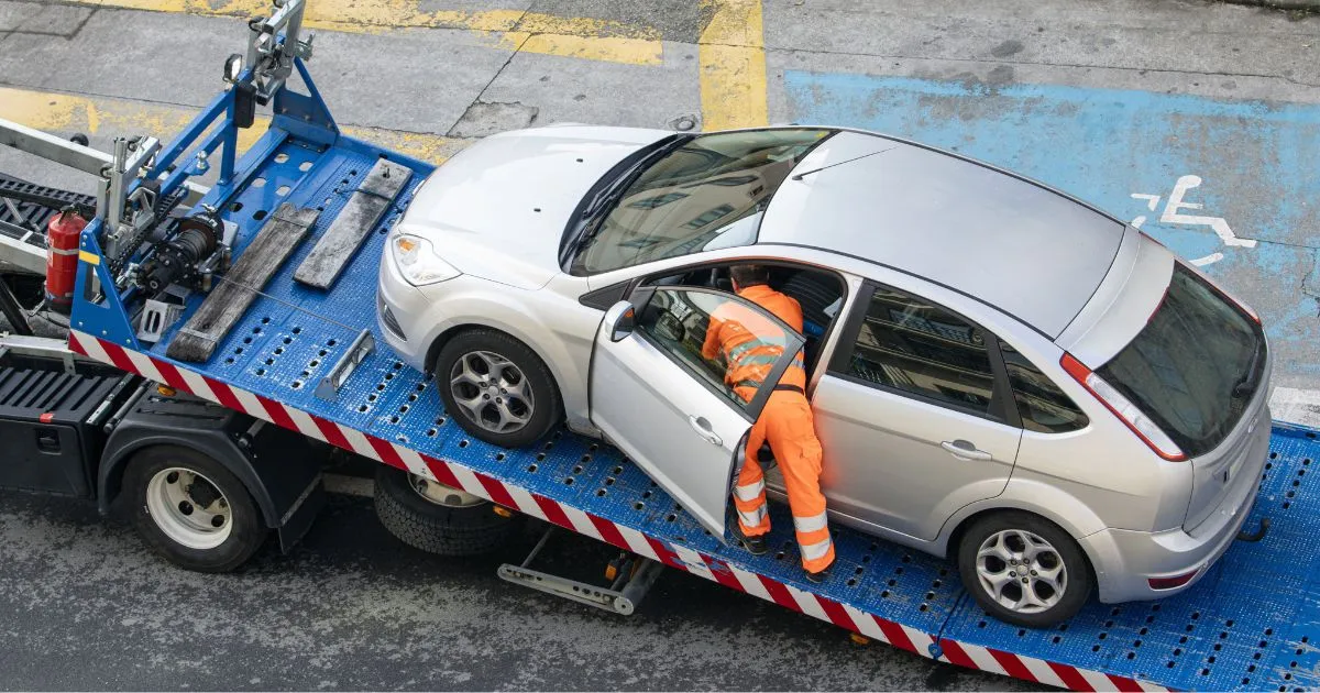 A Vehicle Has Been Towed By The Authorities From An Illegal Parking Space