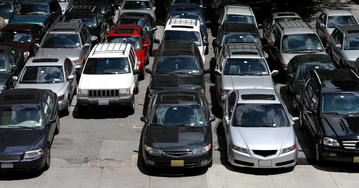 A View Of Public Car Park With Multiple Parked Vehicles