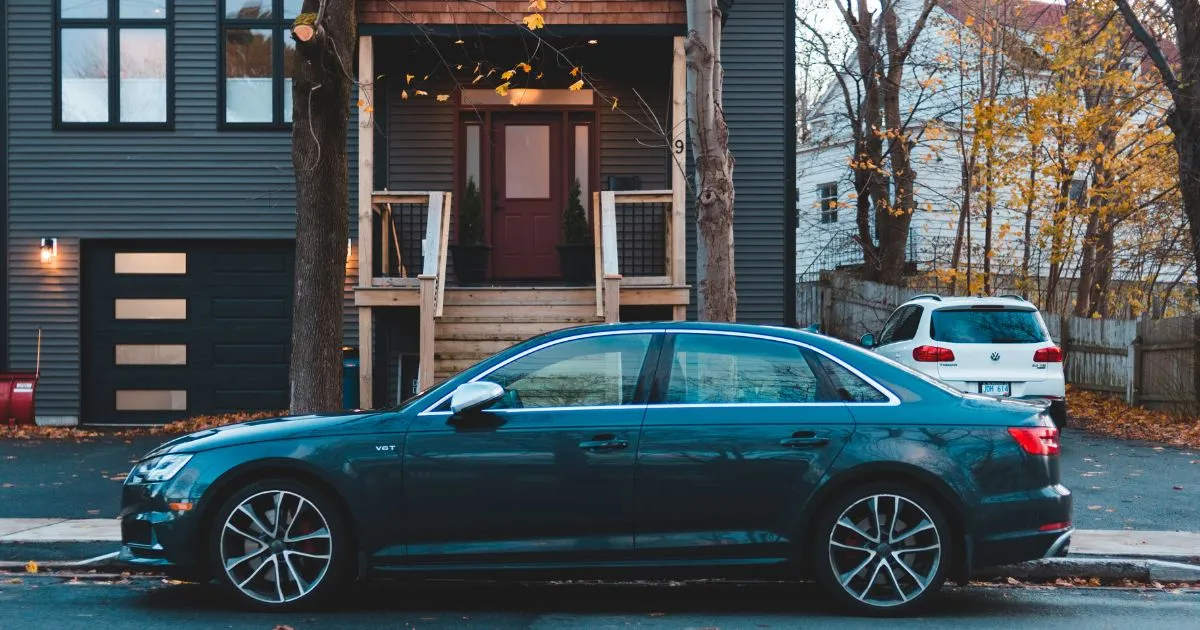 An Apartment With Designated Parking Spaces For Cars