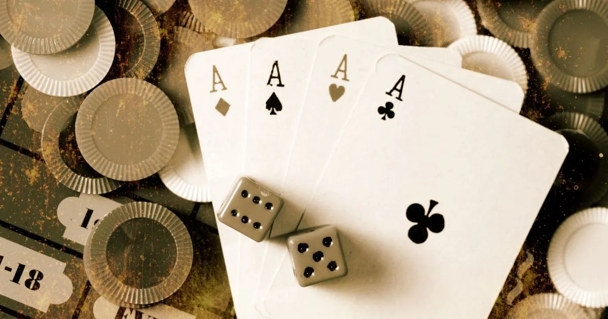 Cards And Coins On The Table In A Casino Cards And Coins On The Table In A Casino
