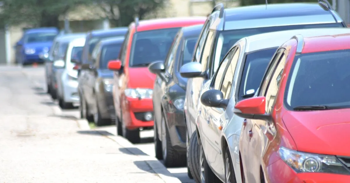Cars Lined Up And Parking In Street