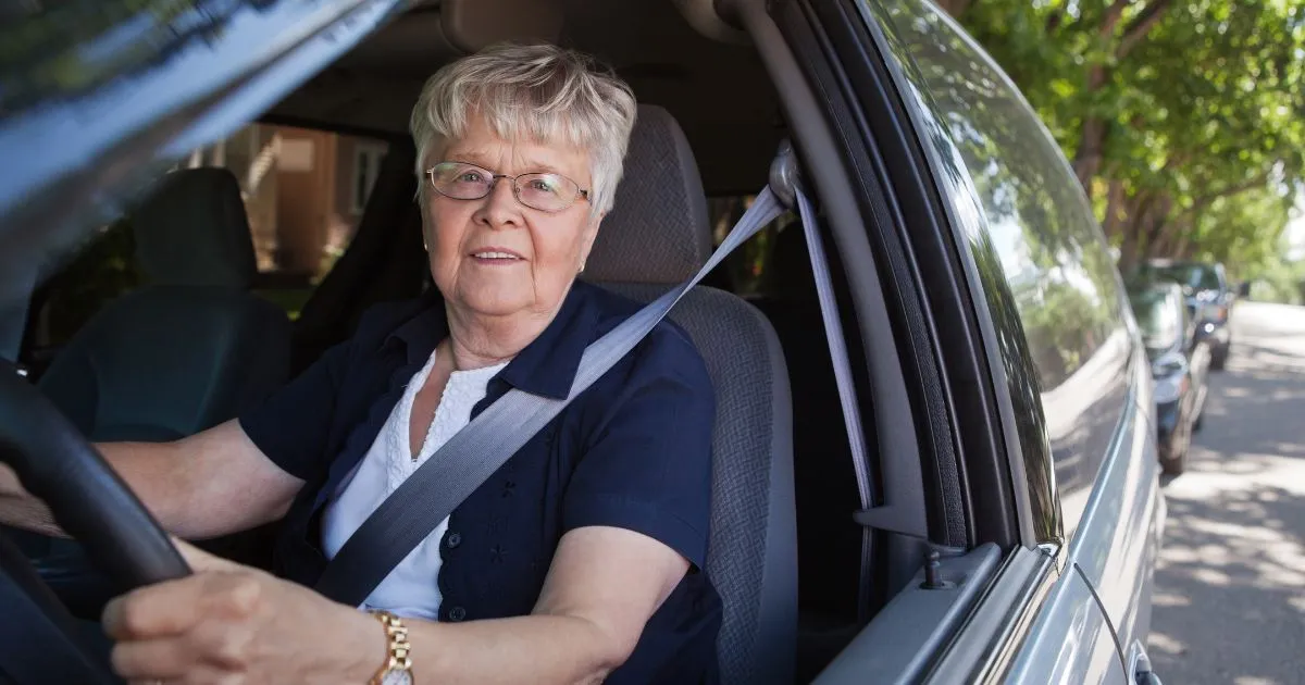 Confident Senior Driver Embracing The Road With Experience And Grace