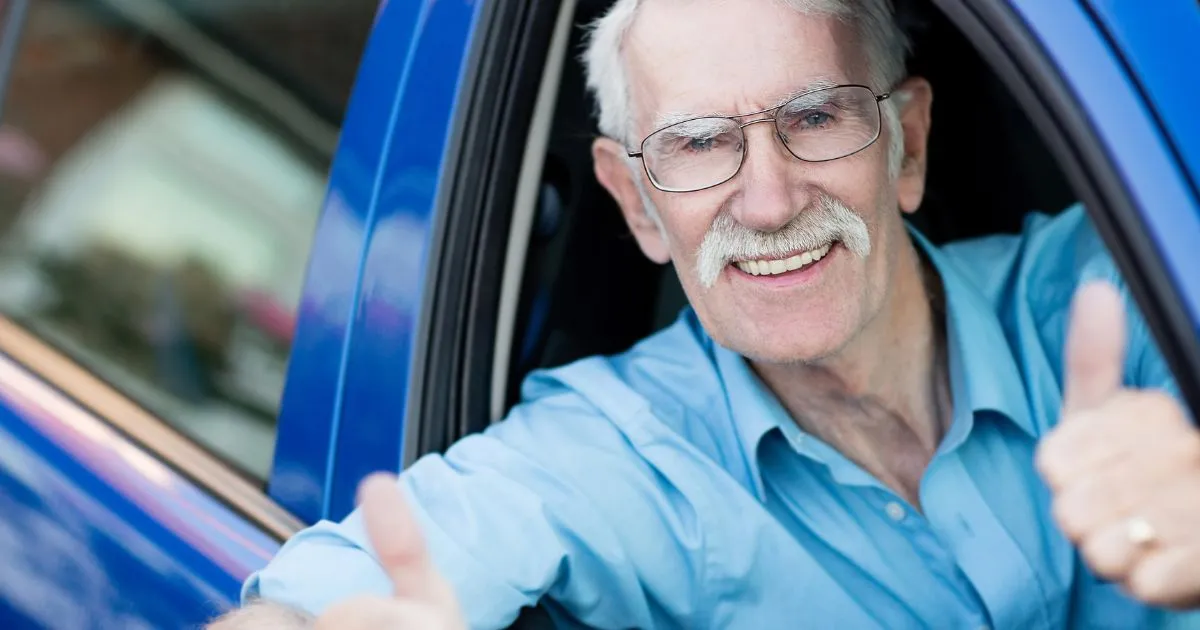 Happy And Confident Driver Giving A Thumbs Up A Positive Driving Experience