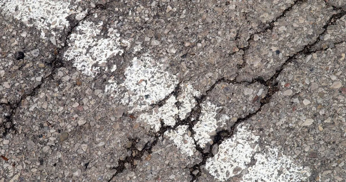 How to Fix Cracks & Potholes In Parking Lots Before They Get Worse