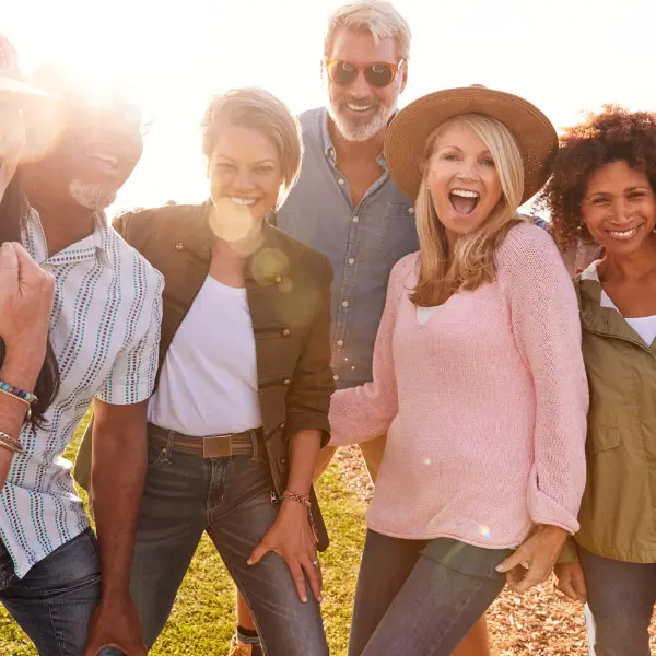 Group Enjoying Parking Referral Program Savings Joy Happy group enjoying outdoors after using our parking referral program to find secure storage spots.