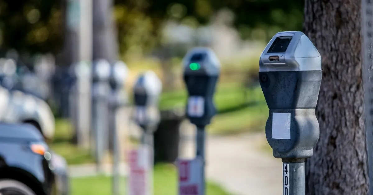 Multiple Parking Meters Installed In A Parking Facility For Remote Payments