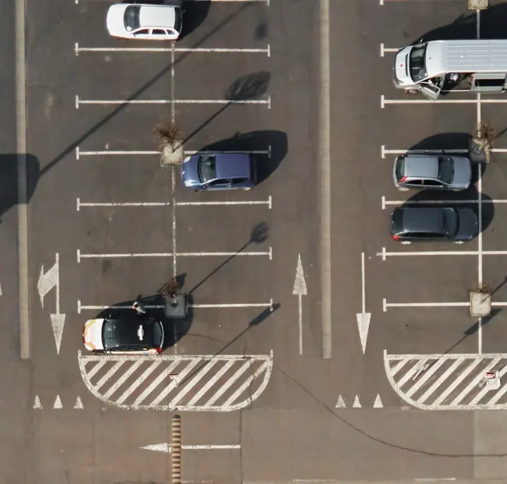 Secure long term airport parking with marked bays and fence. Spacious outdoor long term airport parking offers marked bays and secure fencing to keep your vehicle safe on travel.