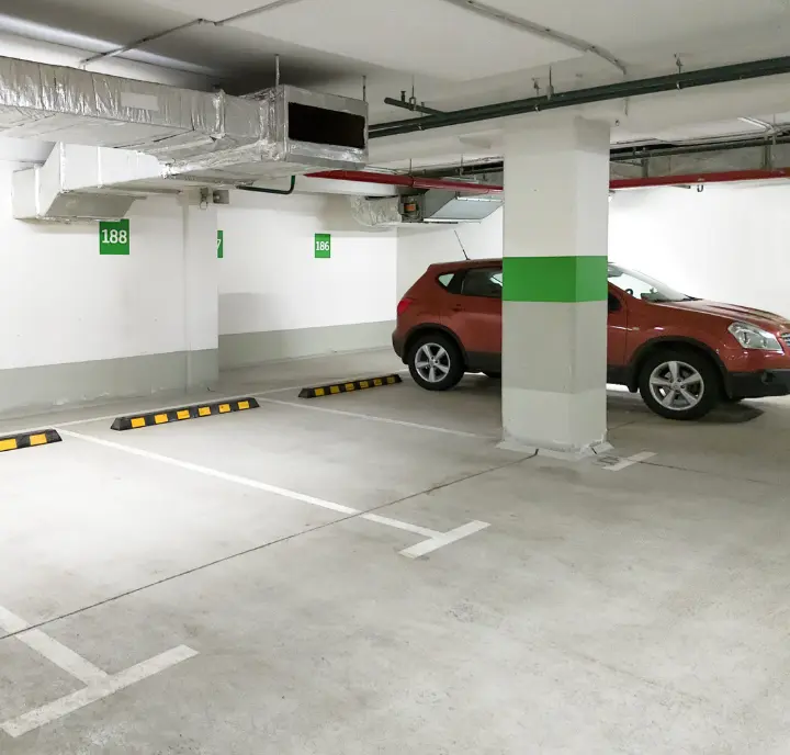 Smart drivers rent parking space in secure underground facilities rather than risking their cars on the busy street.