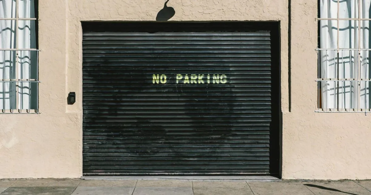 No Parking Written On The Door Of A Garage No Parking Written On The Door Of A Garage