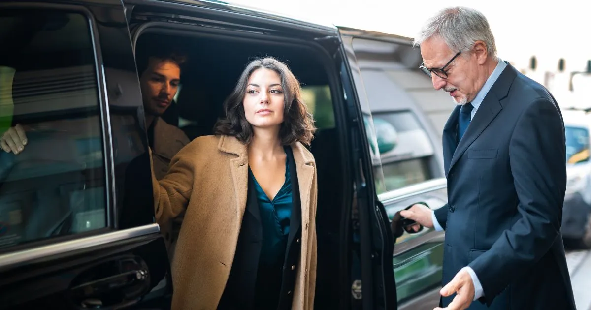 Officer Welcomes Guest Arriving At The Event Via Shuttle Service