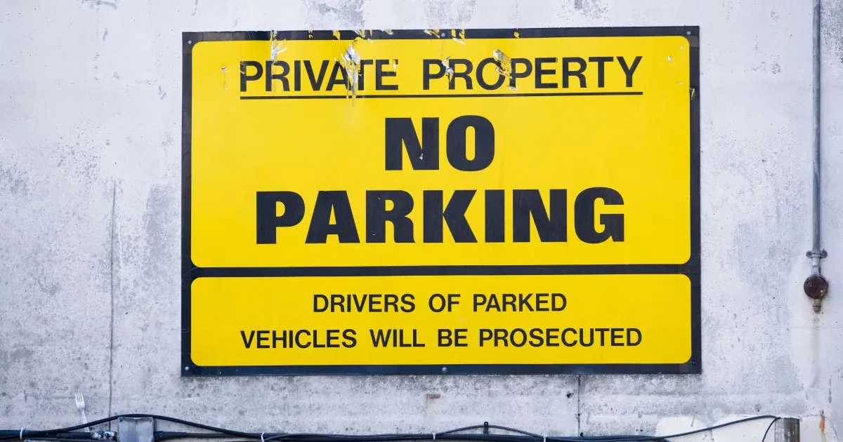 Private Parking Sign Displayed By The Parking Owner