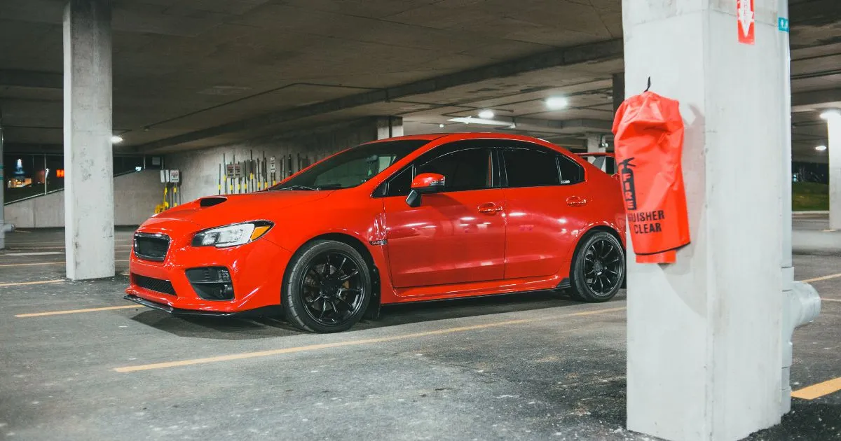 Red Sports Car In Covered Parking Lot Red Sports Car In Covered Parking Lot
