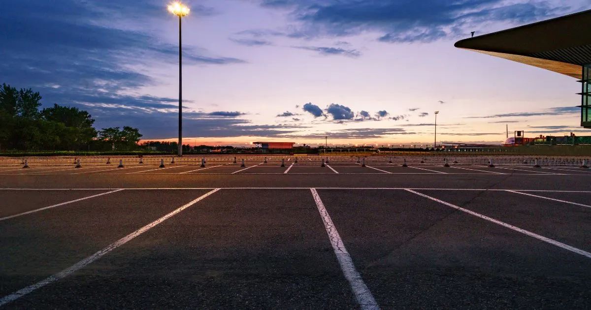 The Evening View Of A Vast Parking Lot Suitable For Hosting Events The Evening View Of A Vast Parking Lot Suitable For Hosting Events