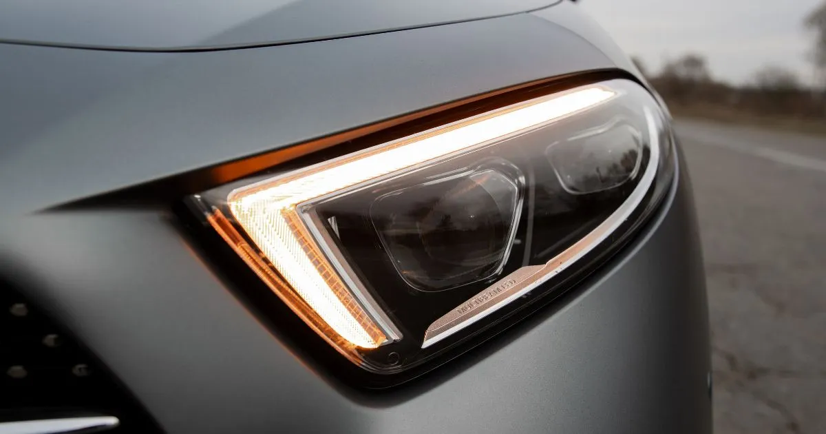 The Headlight Of A Car Parked In A Car Park The Headlight Of A Car Parked In A Car Park