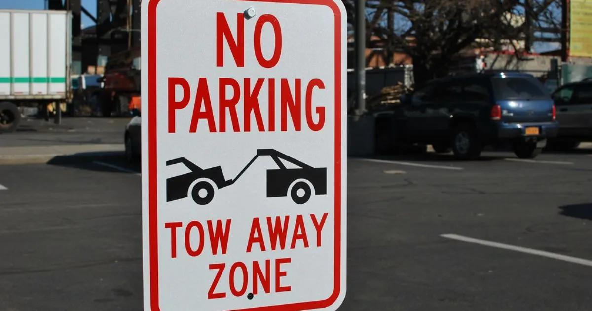 The No Parking Tow Away Zone Sign On The Road The No Parking Tow Away Zone Sign On The Road