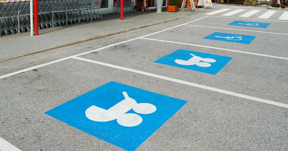 The Parents With Prams Parking Spaces Outside A Mart