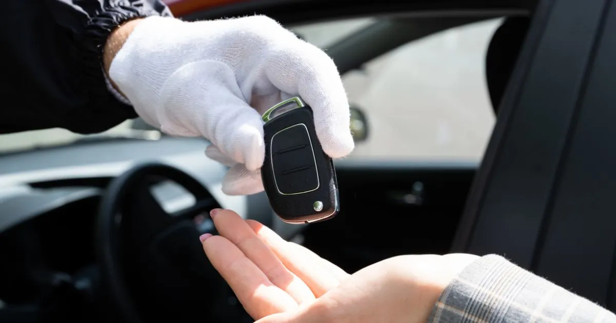 Valet Service A Luxury Car Key Handover Moment Valet Service A Luxury Car Key Handover Moment