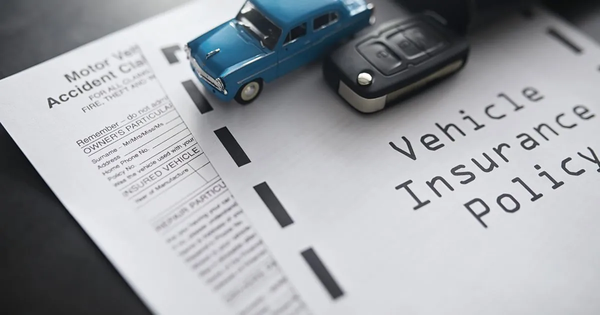Vehicle Insurance Policy Paper On The Table