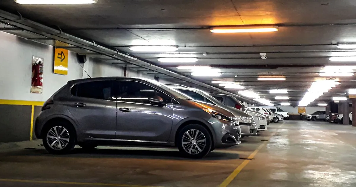 Well-Lit Indoor Parking Garage With Modern Lighting Solutions Well-Lit Indoor Parking Garage With Modern Lighting Solutions